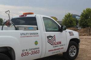 A White Utility Vehicle Used in Sewer Line Repair in Colorado Springs