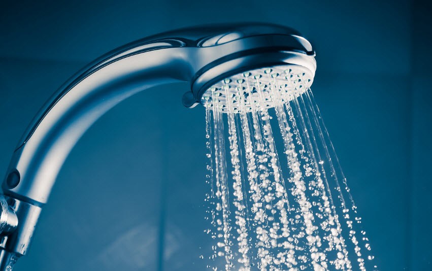 A Shower Head with Water Coming Out
