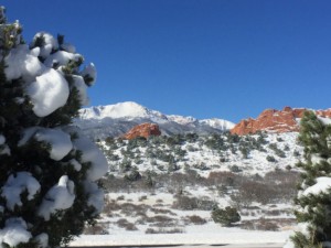 Heating System Repair in Colorado Springs with Snowy Mountain and Trees